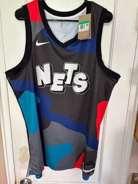 Nike KAWS NETS White Gray NBA Dri-FIT Interior Jersey Label